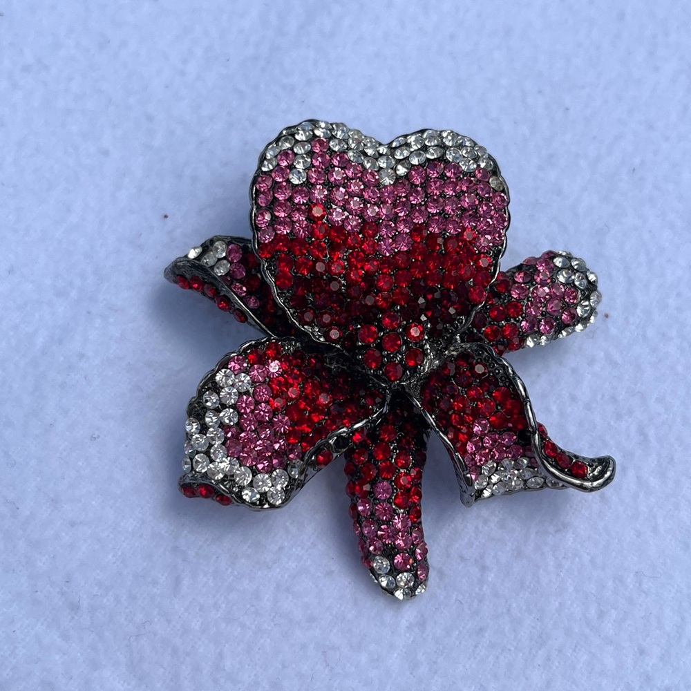 L-S Louis Stern Signed Rhinestone red-pink-white Orchid, gunmetal color on back.
